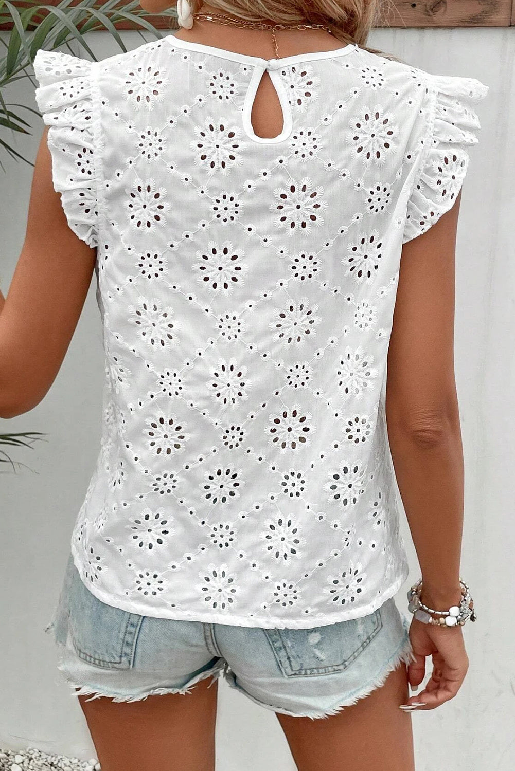 White Sleeveless Blouse